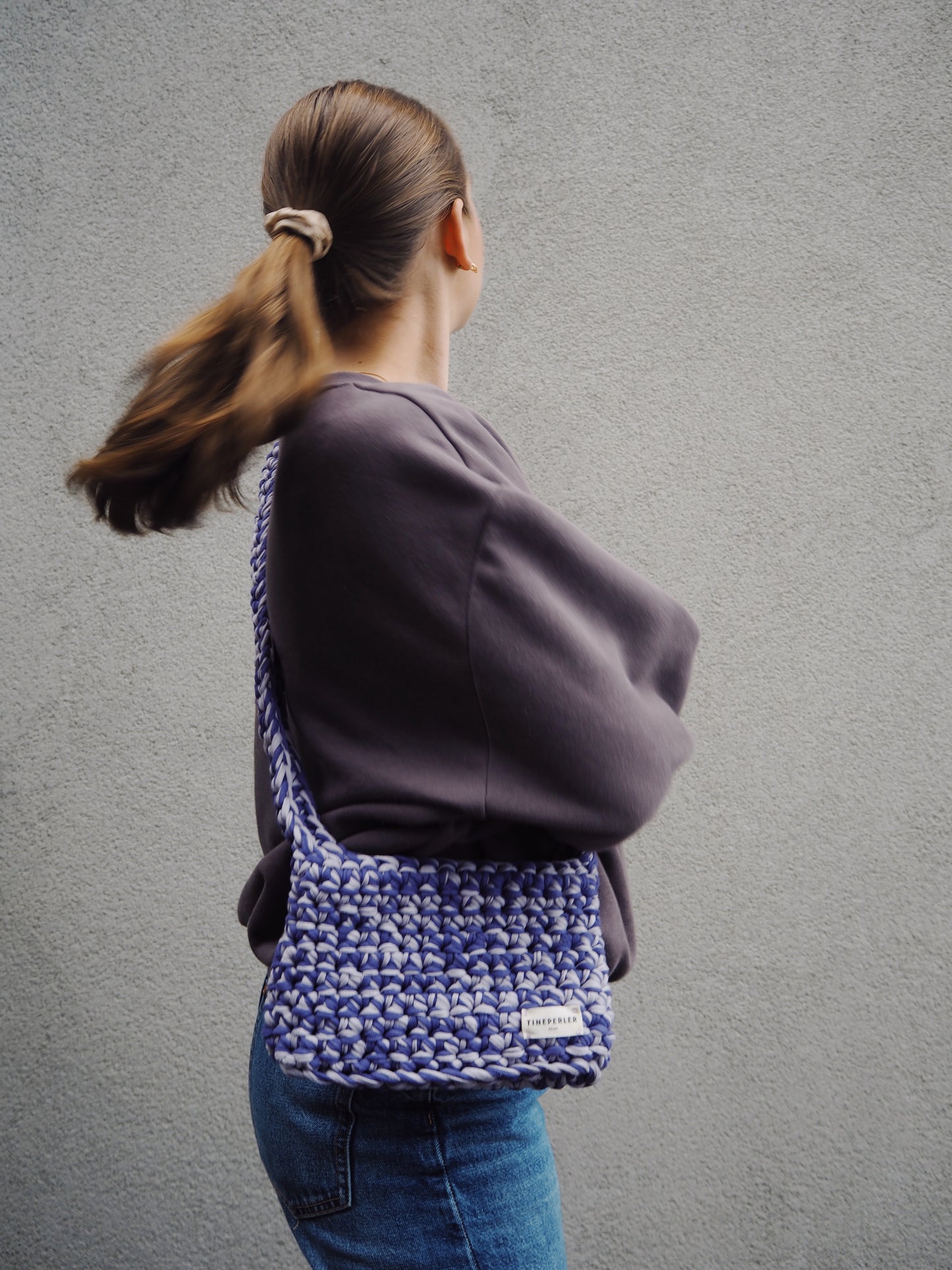 Liten veske, lang hank