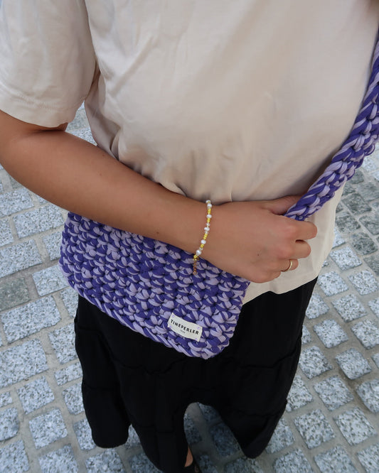 Liten veske, lang hank